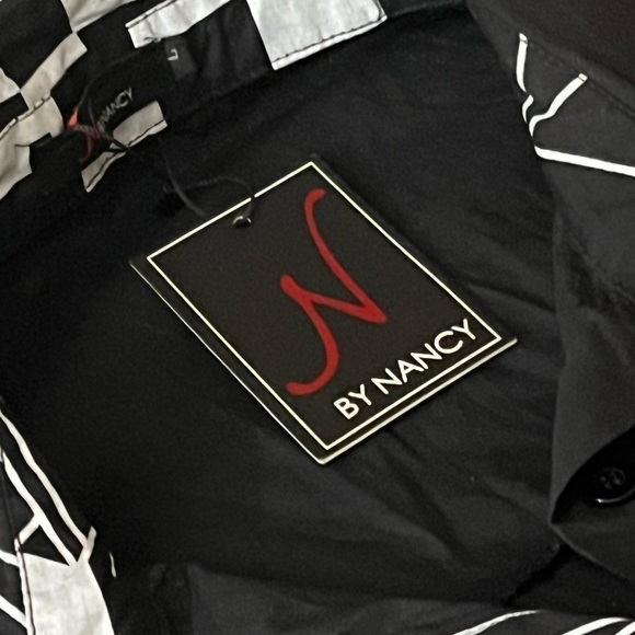 ￼ Women’s size large color, black with white design ￼ - Picture 6 of 7